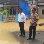 Bantu Korban Banjir di Rawa Karya