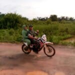 Bersama Sang Istri, Dansatgas Naik Motor Trail ke Lokasi TMMD