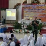 Danramil 418-04/Kertapati Berikan Materi Wasbang Dalam MPLS di SMK Negeri 8 Palembang