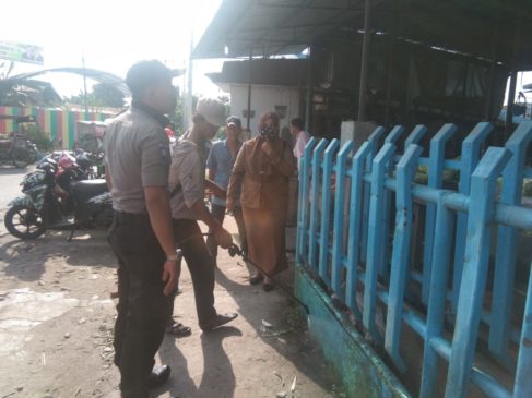 Antisipasi Covid 19, Lurah Teladan Lakukan Penyemprotan Disinfektan di Pajak Bakti