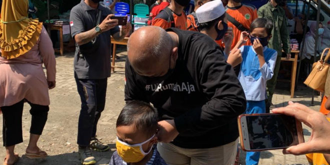 Berbagi Pengetahuan Covid-19 di Hadapan 400 Anak Bantar Gebang