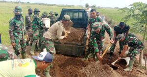 “Terima Kasih Pak TNI Sudah Membangun Jalan Kami”