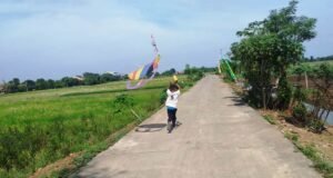 Anak-anak Mulai Menikmati Jalan TMMD