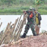TMMD Bersama Warga Bangun Jalan Sepanjang 750 M di Kampung Jawi