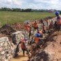 Pembangunan drainase di sekitar ruas jalan tol Indralaya-Prabumulih dengan menggunakan program padat karya.