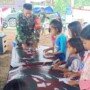 Satgas TMMD Ajak Anak-anak Bermain Origami