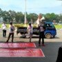 omunitas Masyarakat Peduli Sumatera Selatan (KMPSS), menggelar aksi damai terkait dugaan Korupsi Kolusi Nepotisme (KKN) pada Gubernur Sumatera Selatan (Sumsel) Herman Deru, di depan kantor Pemerintah Provinsi (Pemprov) Sumsel, Rabu (7/4/2021).