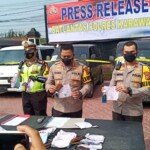 Polres Karawang Amankan 32 Mobil Travel Gelap Hendak Jadi Angkutan Mudik