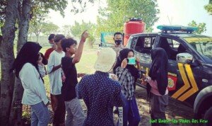 Kapolsek Pedes Pimpin Pencegahan Penyebaran Covid-19 Pakai Mobil Patroli Tangguh