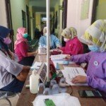 Warga Cibatu Antusias Laksanakan Vaksinasi di Polsek Cibatu