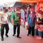 Polsek Plaju Lakukan Sosialisasi PPKM ke Pasar Tradisional
