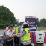 Jumat Barokah, Satlantas Bagikan 100 Karung Beras ke Masyarakat