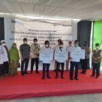 Enos Gandeng Bank Mandiri Serahkan CSR Mobil Ambulance di Kabupaten OKU Timur