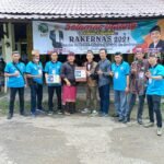 Songkok Gambo, Cindera Mata Muba Untuk IWO