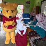 Suskseskan Vaksinasi, SD Bajubang Lintas Sektor Tampilkan Badut