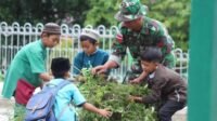 Laksanakan Kerja Bakti, Satgas Pamtas Yonarmed 19/105 Trk Bogani Ajak Siswa Peduli Lingkungan