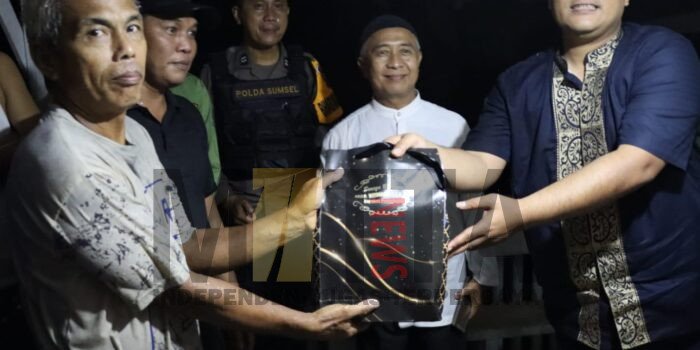 Diguyur Hujan Kapolres Witdiardi Sambangi Poskamling Mangga Besar Prabumulih