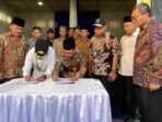 Kendalikan Inflasi, Pj Bupati Aceh Tamiang dan Aceh Tengah Tandatangani Perjanjian KAD