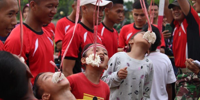 Kemeriahan HUT RI ke 78 di Yonif Raider Khusus 644/Wls, Lomba Makan Kerupuk Hingga Joged Komando