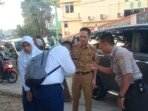 Jelang Dilantik PJ Wali Kota Palembang, Ratu Dewa Antar Anak Sekolah Hingga Apel Pagi