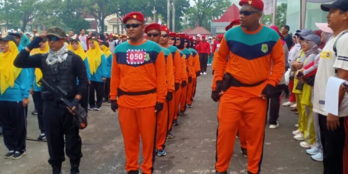 Peringatan HUT PGRI Ke-78 dan HGN 2023, Lomba Gerak Jalan Meriah di Palembang