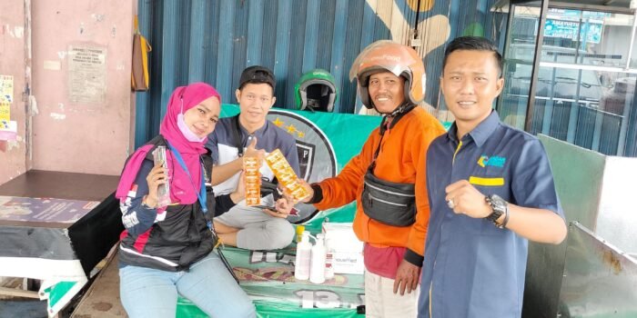 Bantuan Vitamin dan Masker Badar Sumsel untuk Ojol Palembang