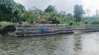Perbaikan Bronjong Penahan Sungai Desa Galang Tinggi-OKU Selatan Akibat Curah Hujan Tinggi  