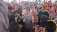 Silaturahmi dengan Ratu Dewa, Ratusan Wali Murid SD-SMP Se Kertapati Terima Bantuan
