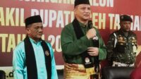 Daftarkan Diri Jadi Calon Bupati dan Wakil Bupati di KIP Aceh Tamiang, Armia Fahmi dan Ismail Gunakan Baju Melayu