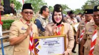 Bupati Musi Rawas Ratna Machmud Hadiri Upacara Peringatan HUT Pramuka Ke-63 di Taman Beregam