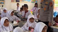 Aksi Gercep Polda Sumsel Sukseskan Program Makan Siang Gratis Prabowo-Gibran Disambut Antusias Ratusan Murid SD
