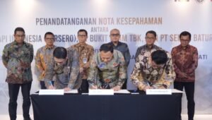 Tingkatkan Kapasitas Bongkar Batu Bara Area Kertapati, Bukit Asam Sinergi dengan KAI dan Semen Baturaja