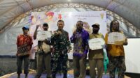 Rayakan Pergantian Tahun, Satgas Yonif 144/JY Bergembira Bersama