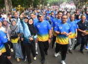 Gubernur Herman Deru Buka Jalan Sehat IKA UII, Tekankan Pentingnya Peduli Sesama