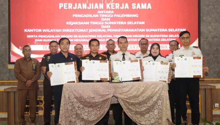Karutan Kelas I Palembang Hadiri Penandatanganan PKS Persidangan Elektronik