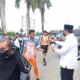Asap Karhutla Kepung Fakfak, DPRK Bagikan 500 Masker untuk Pelajar